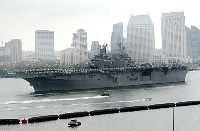 The amphibious assault ship USS Boxer (LHD 4) departs Naval Base San Diego on a scheduled Western Pacific deployment as part of Expeditionary Strike Group Five (ESG-5).
